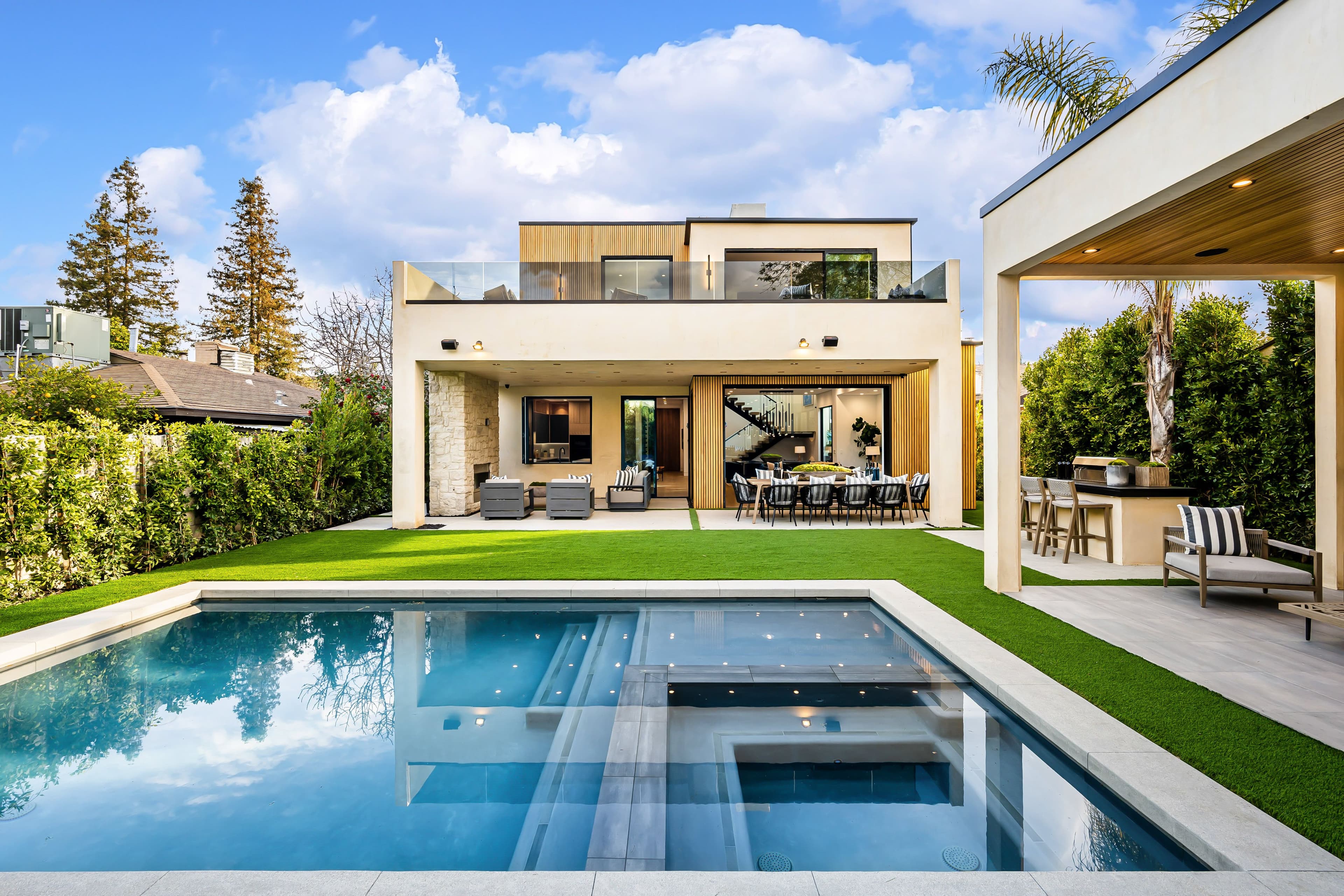 Modern luxury villa with pool and outdoor living.